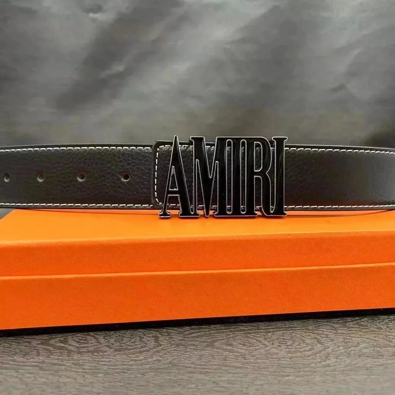Amiri men's black belt with MA logo gold and metal buckle